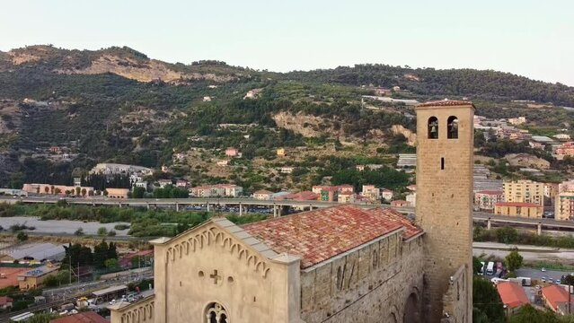 Aerial drone shot of a view of the church of San Michele Arcangelo in the medieval old town of Ventimiglia in Italy, Liguria, Italy. Beautiful panoramic aerial view from flying unmanned aerial vehicle