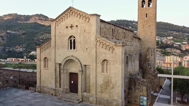 Aerial drone shot of a view of the church of San Michele Arcangelo in the medieval old town of Ventimiglia in Italy, Liguria, Italy. Beautiful panoramic aerial view from flying unmanned aerial vehicle