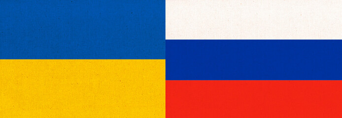 Flag of the two countries. Ukrainian and Russian two folded flags