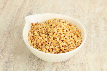 Crunched roasted peanut in the bowl