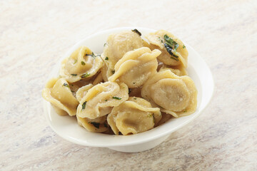 Russian boiled dumplings with meat