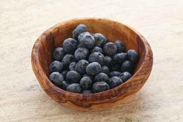 Sweet ripe blueberry heap in the bowl