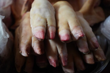 Almaty, Kazakhstan - 03.25.2022 : Different parts of pork are laid out for sale on the market.