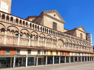 Fototapeta na wymiar Cathedral of Saint George with shops in Ferrara.