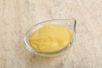 Organic mustard sauce in the bowl