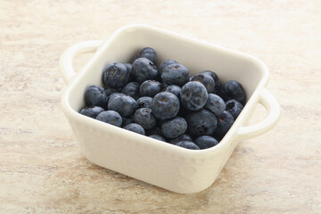 Sweet ripe blueberry heap in the bowl