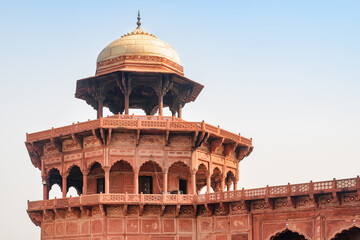 Amazing view of red sandstone octagonal tower with dome, Agra