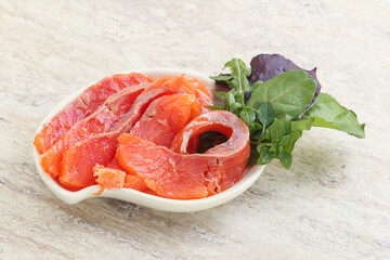 Sliced salmon fillet starter snack
