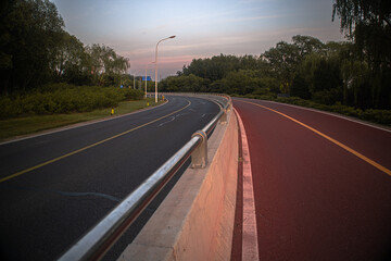 sunset over the road