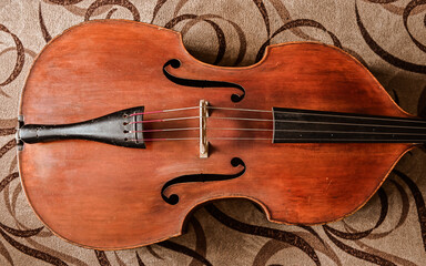 Obraz premium classic wooden double bass close-up. isolated.