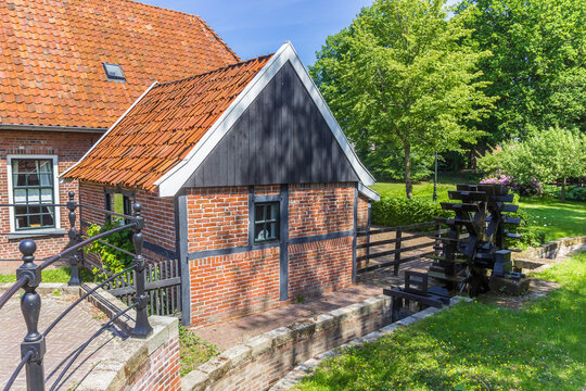 Historic water mill Molenhuisje in the center of Ootmarsum, Netherlands