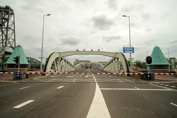 Velvet curtains Erasmus Bridge koninginnebrug, bridge between Island named Noordereiland and the south of Rotterdam opens