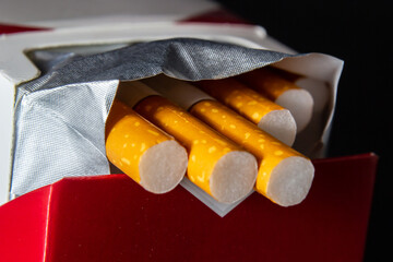 Close up cigarette in pack is addictive to be cancer.smoking reduction campaign in World No Tobacco...