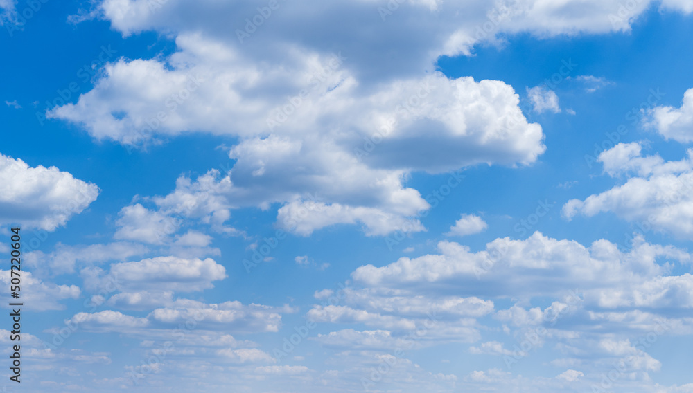 Wall mural white clouds in blue summer sky panoramic background