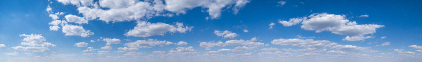 White clouds in blue summer sky panoramic  background