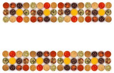 Set of spices in jars on a white background. Many diverse Indian spices, herbs, peppers. Flat lay.