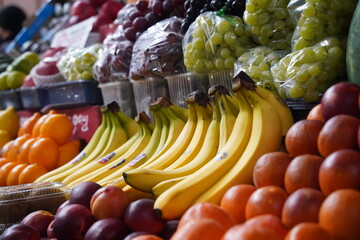 Almaty, Kazakhstan - 03.25.2022 : Bananas and various fruits are laid out for sale at the market