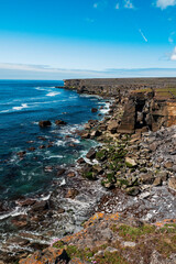 Rough stone terrain and cliffs of Aran island. county, Galway, Ireland. Irish landscape. Warm sunny...