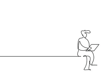 a person comfortably uses a computer laptop at home or in the office