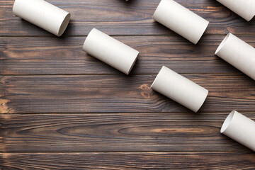 Flat lay composition with empty toilet paper rolls and space for text on color background....