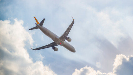 Airplane flying in the spring taking off from Italy