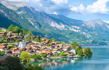Fototapeta na wymiar view on alpine town Oberried am Brienzersee on Brienz lake in Switzerland
