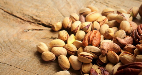 Assorted nuts close-up selective focus, organic food, mental health, 