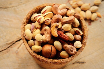 Assorted nuts close-up selective focus, organic food, mental health, 