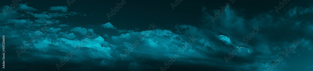 Wall mural night sky with clouds. dark dramatic sky background with space for design. web banner. wide. panoram