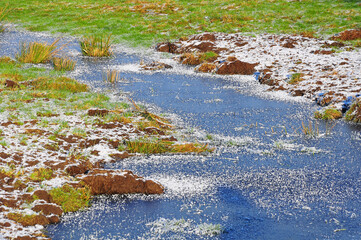 frozen river on a meadow in germany