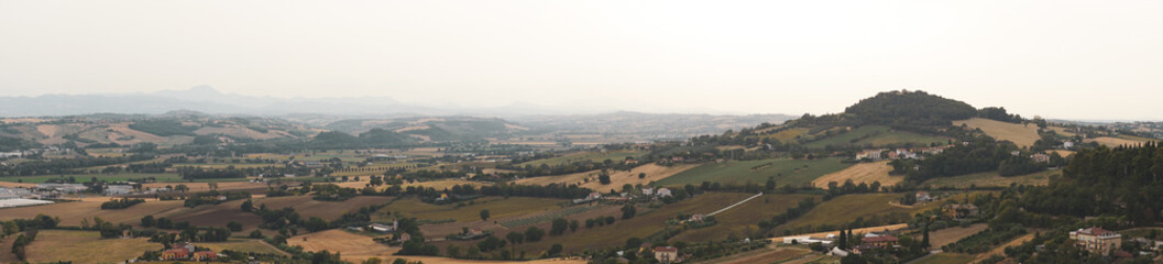 Panoramic view of Marche hills. Italian countryside in central Italy, in the Marche region....