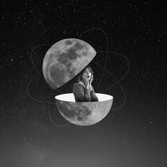 Contemporary art collage. Shocked young woman sticks out from split planet isolated on dark starry background. Monochrome. Minimalism