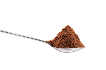 A heaped teaspoon of hot chocolate powder mix on a silver teaspoon. White background. Copy space.