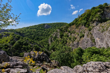 Rocky Mountain Cliffs On Spring Day. Blue Sky With Clouds. . Nature Landscape