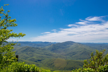 panorama of a beautiful mountainous area. sunny in the afternoon. beautiful spring landscape in the mountains.