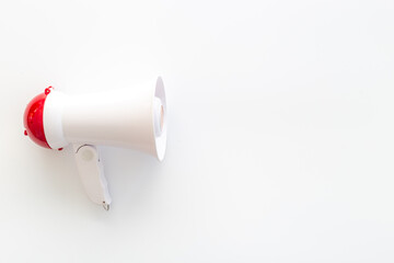 Fototapeta premium White loudspeaker for announcing hiring or advertising. Megaphone device