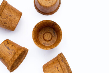 Coco coir pots on white background.