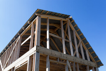 Construction of a wooden frame house