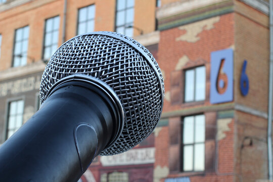 Reporters With Microphones