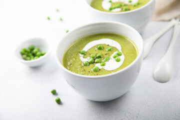 Homemade green pea soup with cream