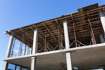 Construction of the frame of a new house in the countryside