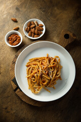 Pasta with red pesto and cheese