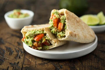 Pita bread sandwich with guacamole