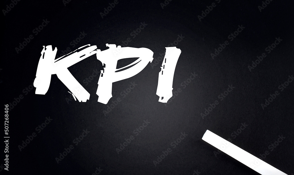 Poster kpi key performance indicator text on a black chalkboard with a piece of chalk