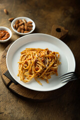 Pasta with red pesto and cheese