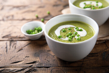 Homemade green pea soup with cream