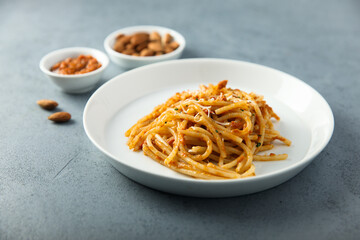 Pasta with red pesto and cheese