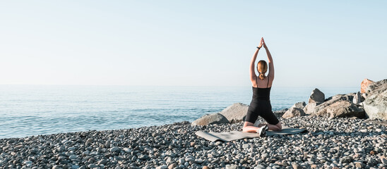 sport fit outdoor sea.girl goes sports,fitness,yoga seashore.Meditation, relaxation, mental...