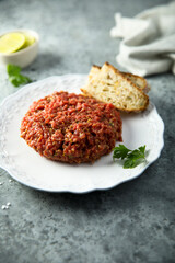 Homemade steak tartare served with bread