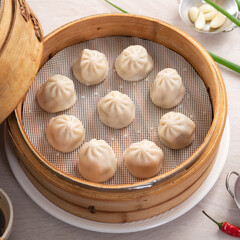 Steamed pork soup dumplings named Xiao long bao in Taiwan.